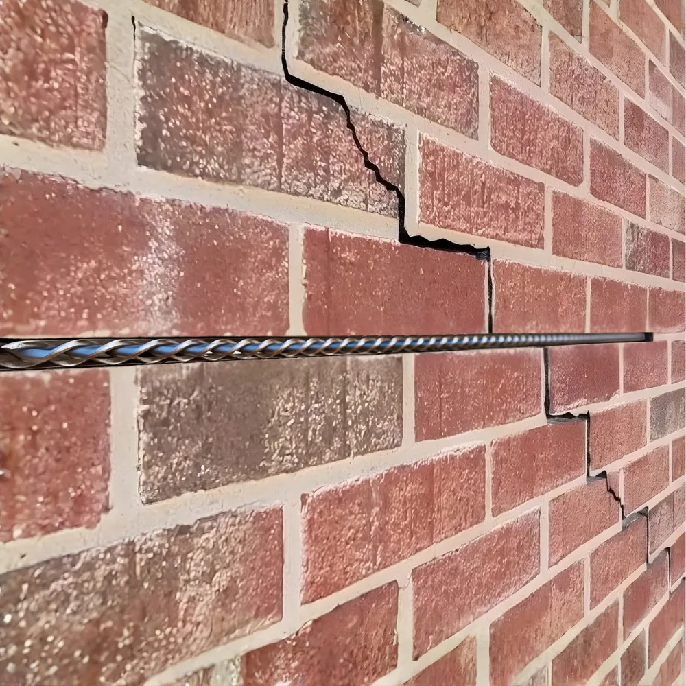 Wall crack repair — HelicalBar™ stainless steel reinforcement bonded into a brick wall